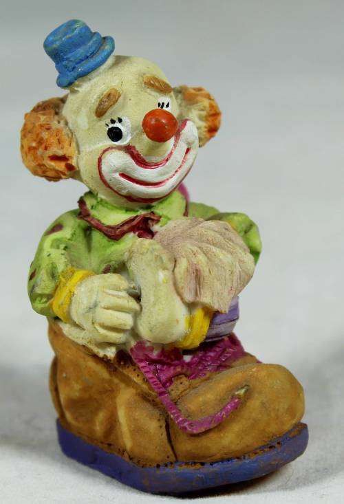 Miniature clown in a shoe