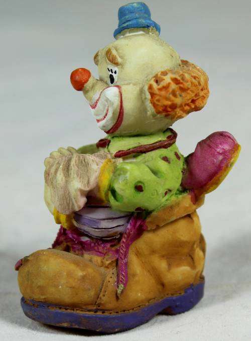 Miniature clown in a shoe