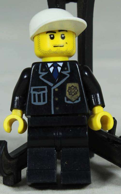 Lego mini figurine - Policeman with a smile and stubble beard