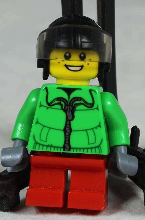 Lego mini figurine - Boy at Christmas with an Avatar helmet