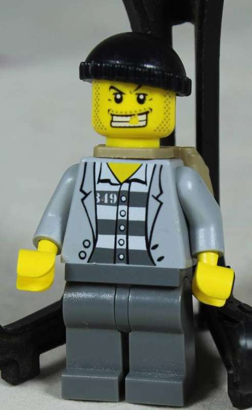 Lego mini figurine - Jail prisoner with gold tooth and back pack (CTY0201)
