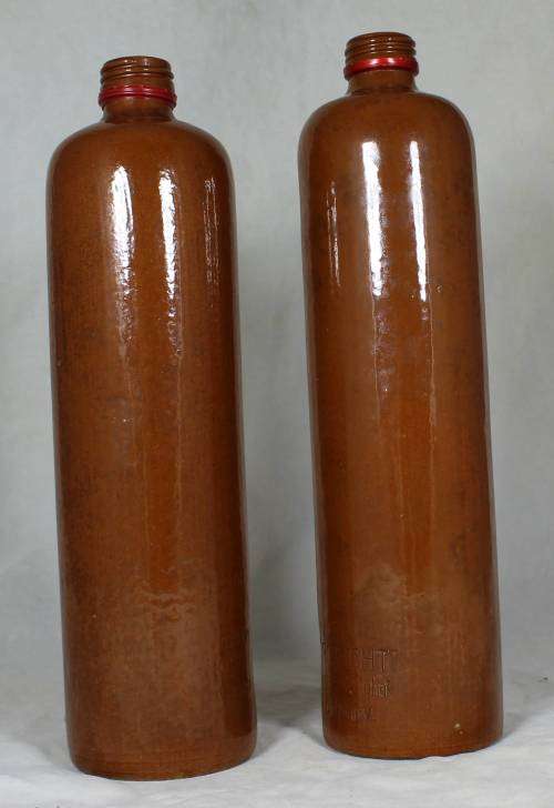 Pair of large earthenware bottles