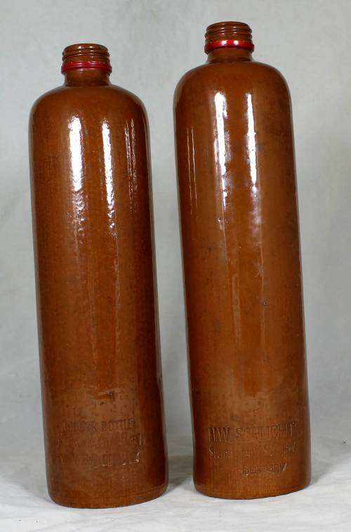 Pair of large earthenware bottles