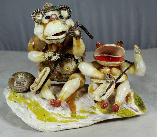 Fishing of the rocks shell sculpture