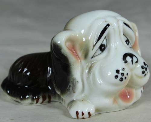 PORCELAIN DOG LYING DOWN-BID NOW!!
