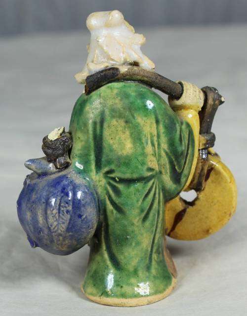 MUD MAN CARRYING LARGE STONES(EXTRA ORDINARY CRAFTSMANSHIP AND A MUST HAVE)-BID NOW!!
