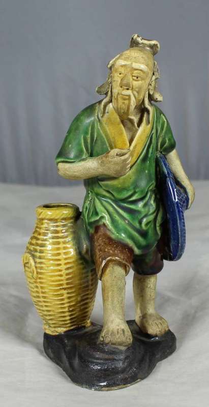 MUD MAN WITH A LARGE WICKER BASKET(EXTRA ORDINARY CRAFTSMANSHIP AND A MUST HAVE)-BID NOW!!