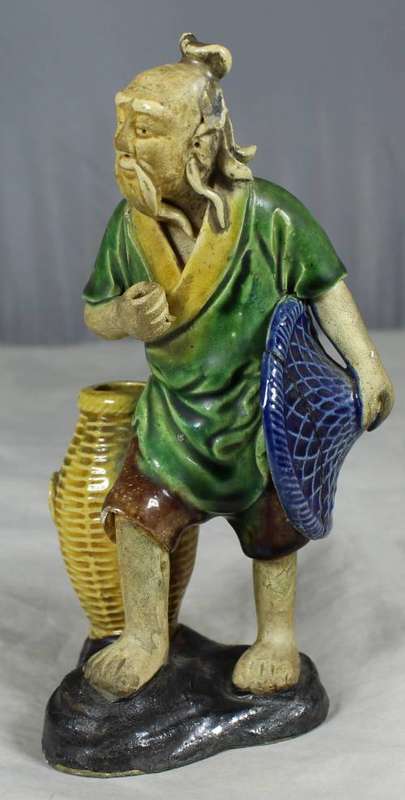 MUD MAN WITH A LARGE WICKER BASKET(EXTRA ORDINARY CRAFTSMANSHIP AND A MUST HAVE)-BID NOW!!