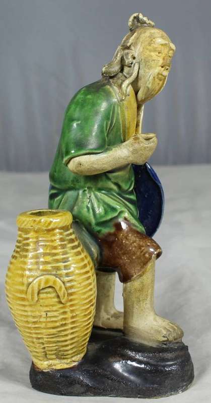MUD MAN WITH A LARGE WICKER BASKET(EXTRA ORDINARY CRAFTSMANSHIP AND A MUST HAVE)-BID NOW!!