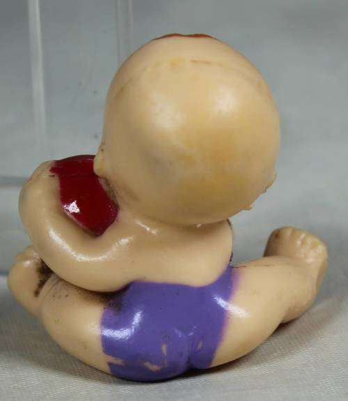 MINIATURE PLASTIC BABY WITH A BALL BID NOW!!