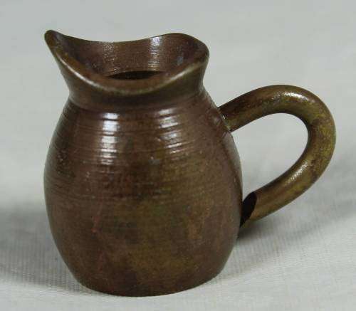 Miniature brass milk jug
