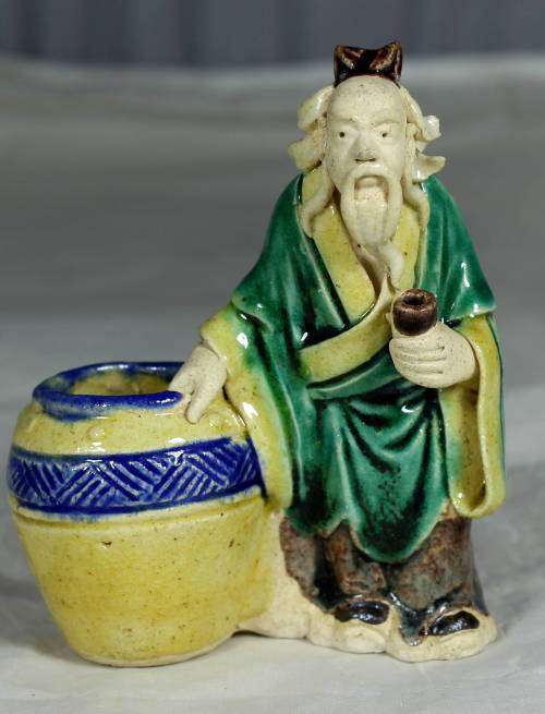 Collectible mud men - very old man with a barrel