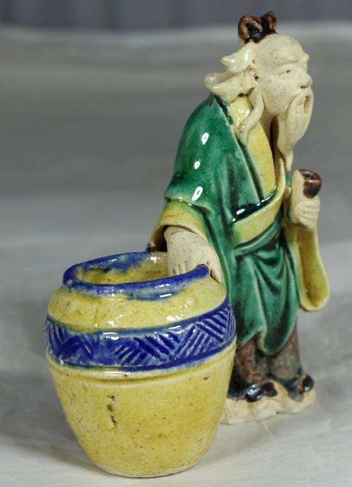Collectible mud men - very old man with a barrel