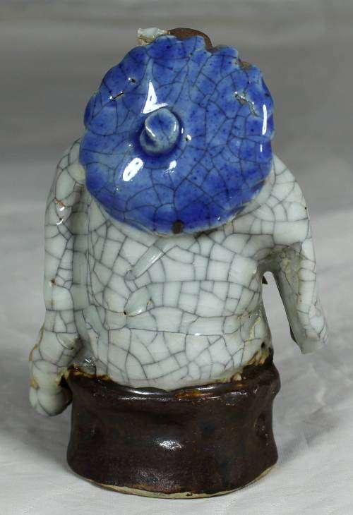 Collectable mud men - seated man with a special robe