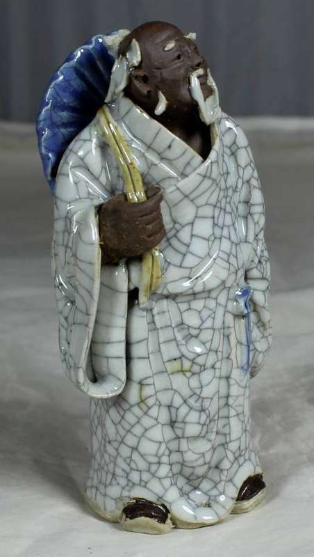 Collectible mud men -  old man with a special robe