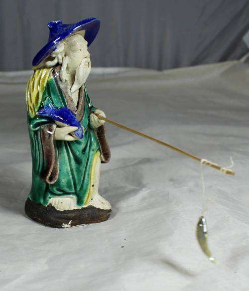 Collectible mud men - old man going fishing