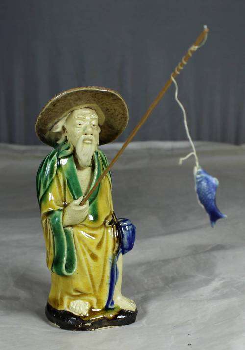 Collectible mud men - old man going fishing