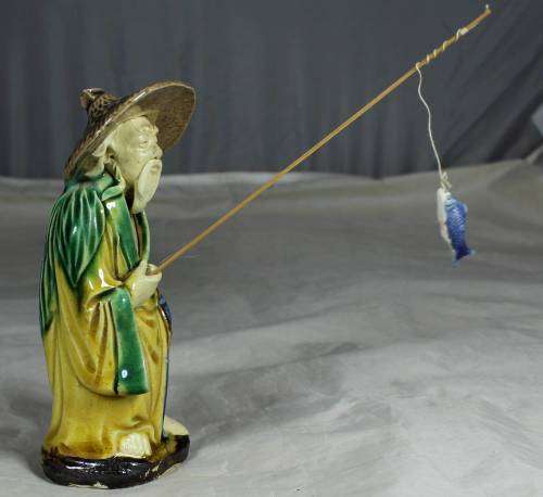 Collectible mud men - old man going fishing