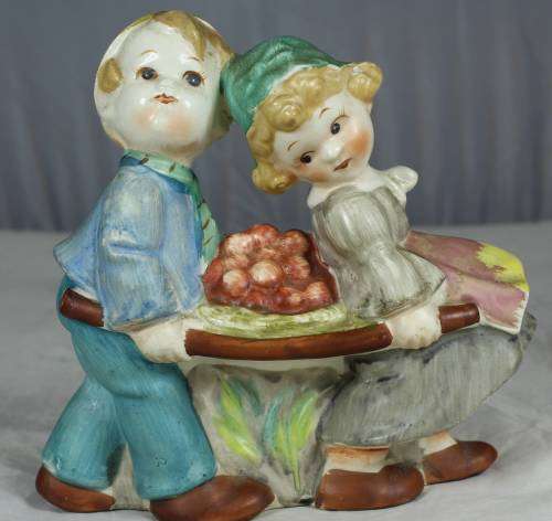 Wall scones - two kids carrying fruit