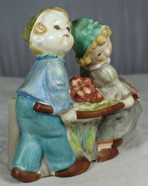 Wall scones - two kids carrying fruit