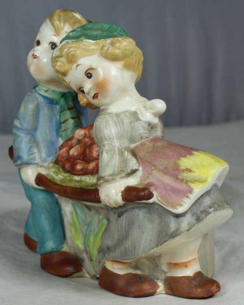 Wall scones - two kids carrying fruit