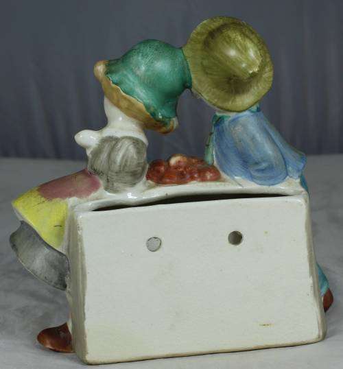 Wall scones - two kids carrying fruit