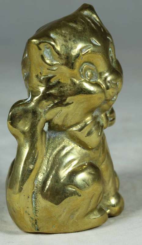 Brass cat with a bow tie