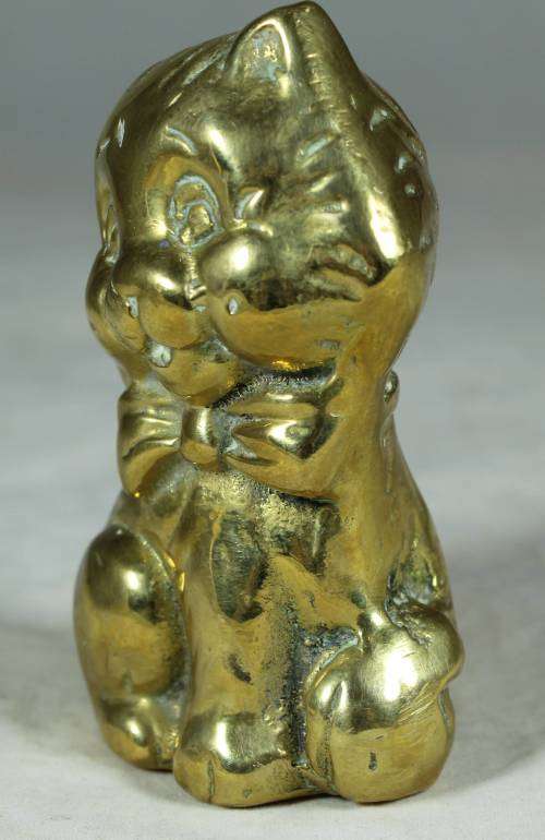 Brass cat with a bow tie