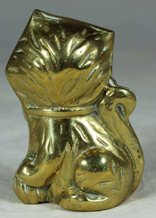 Brass cat with a bow tie