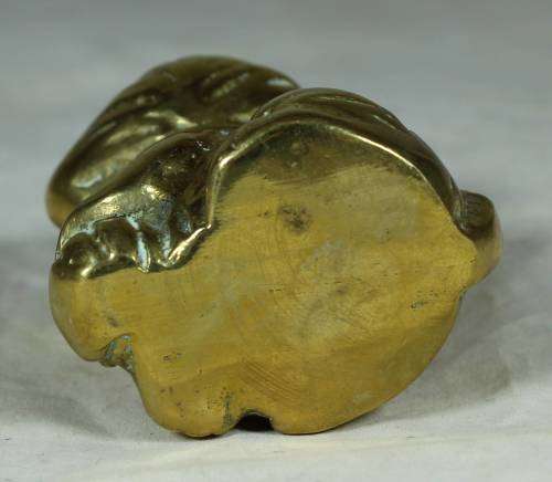 Brass cat with a bow tie