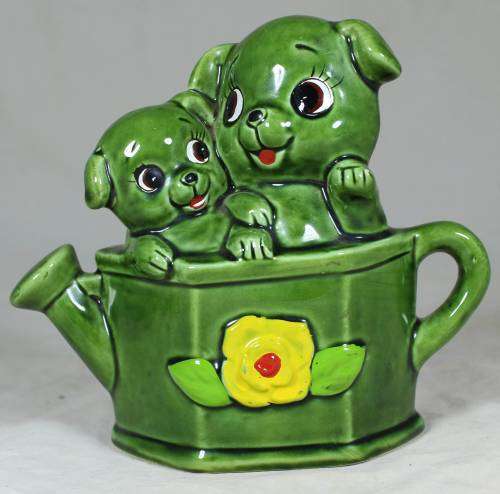Porcelain puppies in a watering can - money box