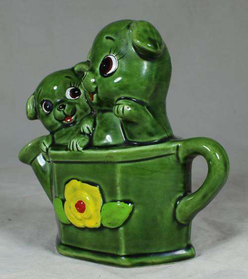 Porcelain puppies in a watering can - money box