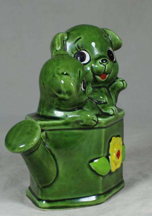 Porcelain puppies in a watering can - money box