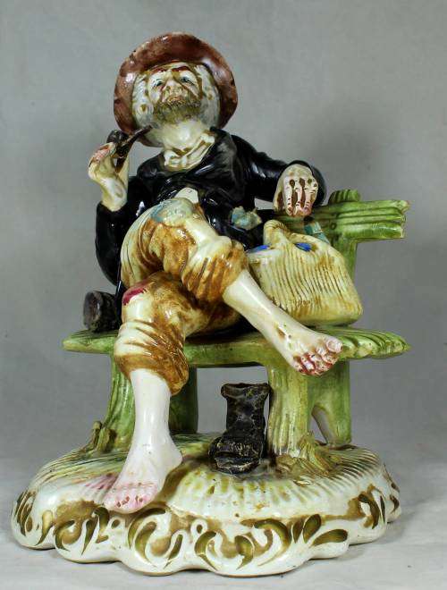 Capodimante - tramp sitting on a bench