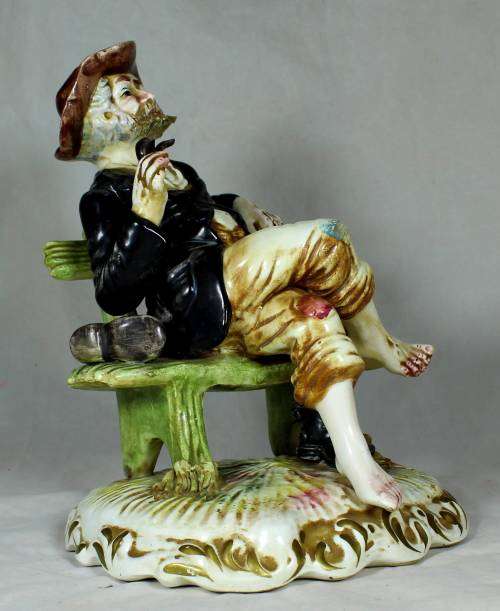 Capodimante - tramp sitting on a bench