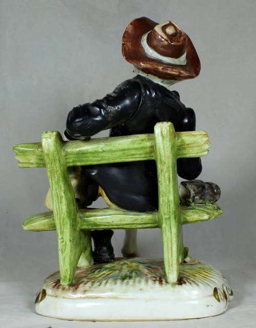 Capodimante - tramp sitting on a bench