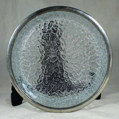 Large pressed glass bowl with a silver plated rim