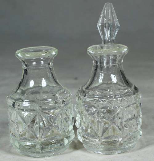 PAIR OF CONDIMENT GLASS HOLDERS