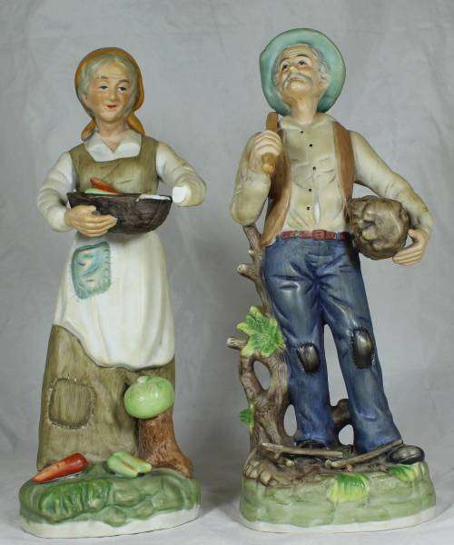 Pair of tall figurines - farmer and his wife