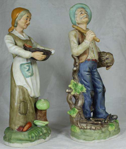 Pair of tall figurines - farmer and his wife
