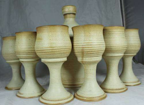 Stoneware decanter and six glasses