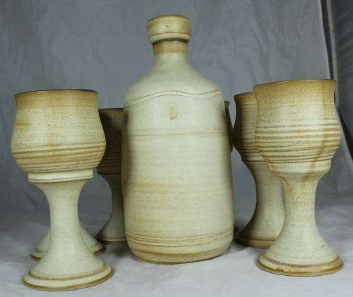 Stoneware decanter and six glasses