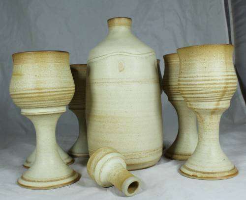 Stoneware decanter and six glasses