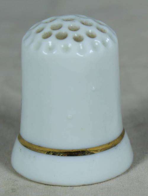 Porcelain thimble - red bird on a tree
