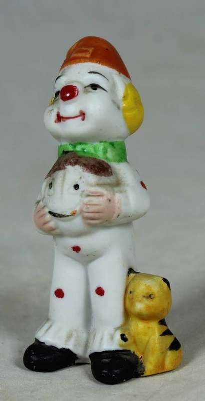 Miniature clown with a cat