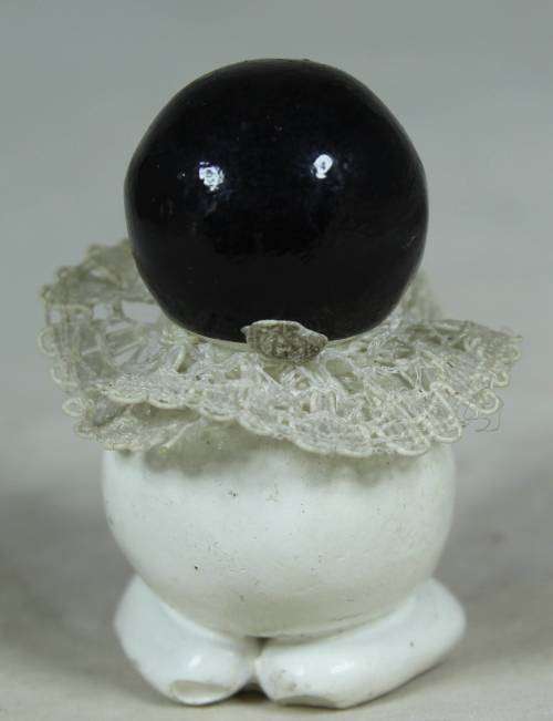 Miniature clown with pouted lips