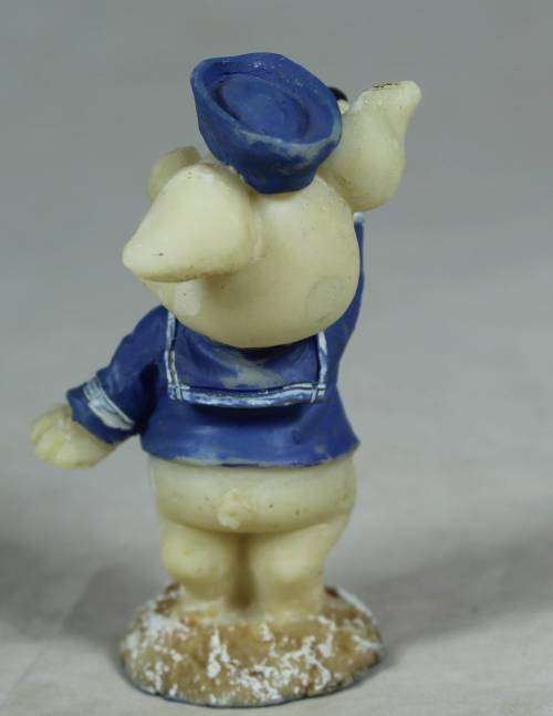Miniature piggy with binoculars