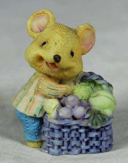Miniature mouse with a large basket