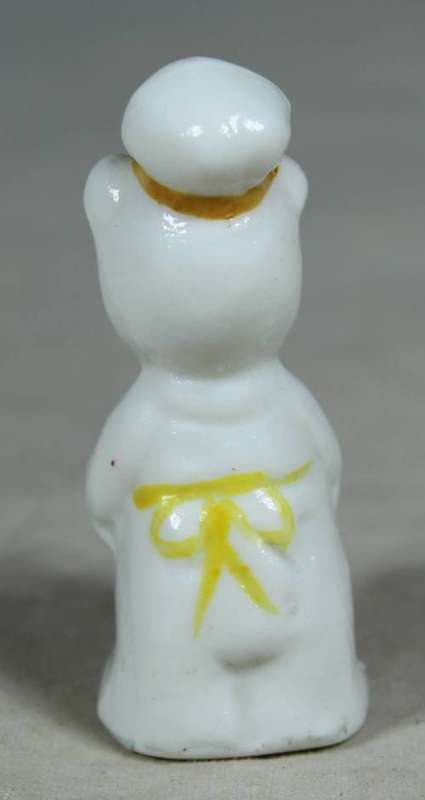 Miniature chef kitty with bread
