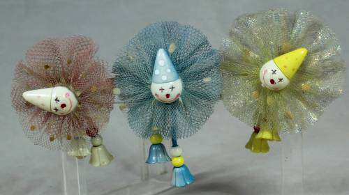 Miniature set of three smiling clowns